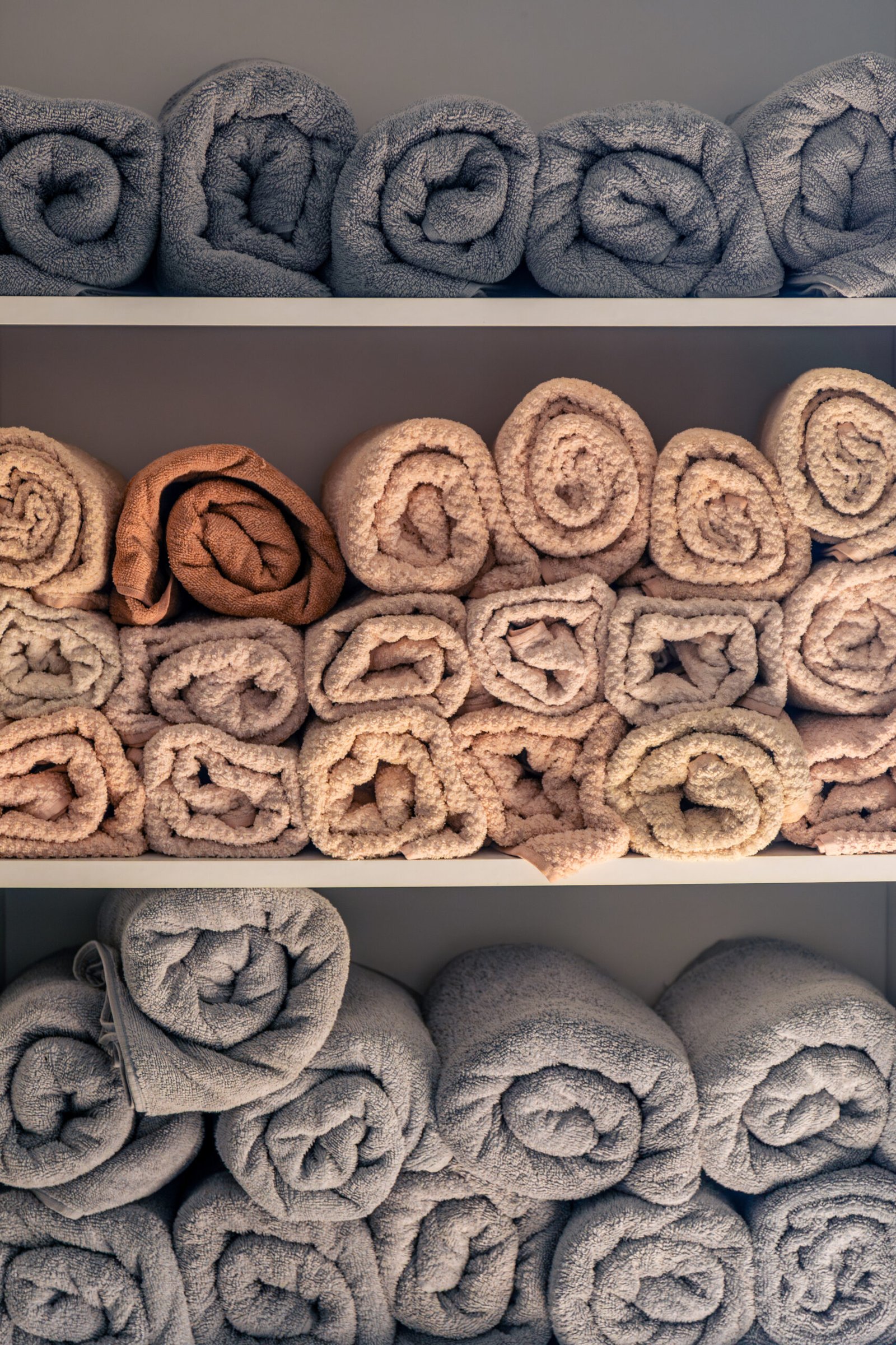 modern shelf with soft towels for spa. wellness towels.